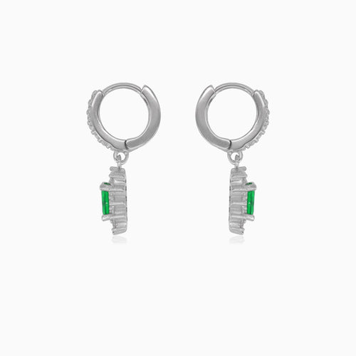 Halo silver dangling earrings with synthetic emerald