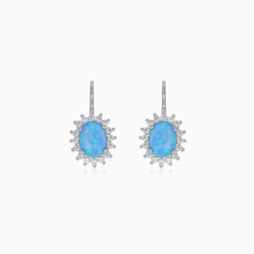 Sterling silver halo blue oval opal earrings