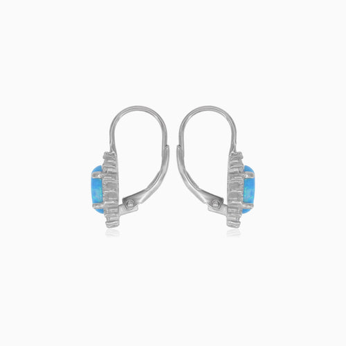 Sterling silver halo blue oval opal earrings