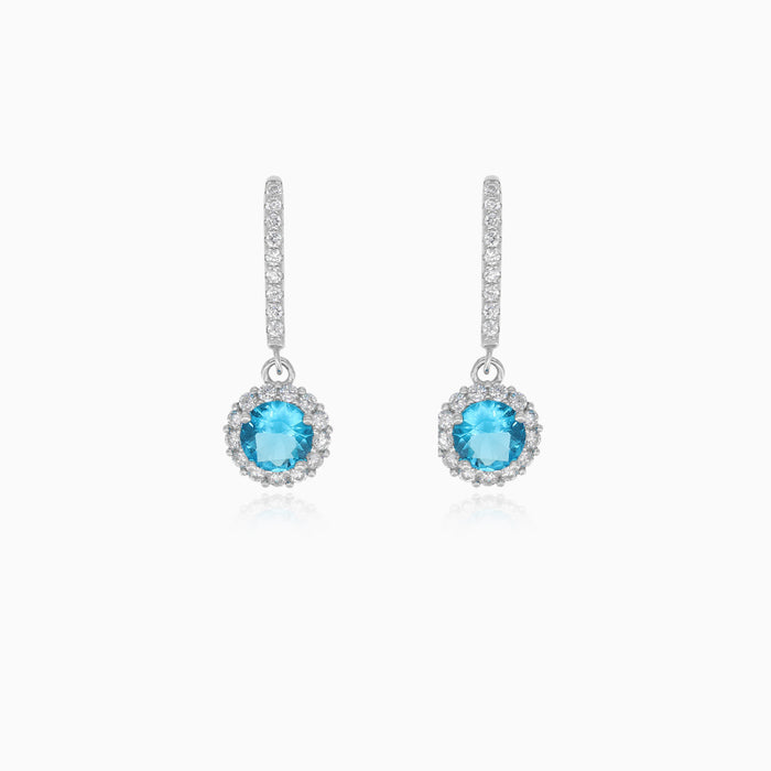 Pendientes halo de topacio azul de plata esterlina