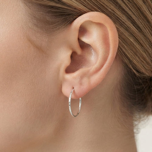 Sterling Silver Hoops with a Faceted Pattern