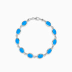 Sterling silver bracelet with blue opal accents