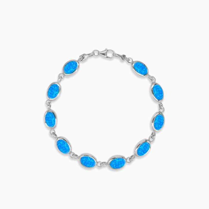 Sterling silver bracelet with blue opal accents