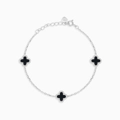 Sterling silver bracelet with onyx clovers