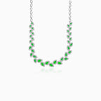 Sterling silver necklace with emerald halo