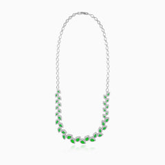 Sterling silver necklace with emerald halo