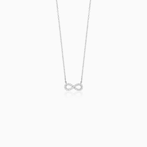 Sterling silver infinity necklace with sparkling round cut cubic zirconia. A refined symbolic design with delicate brilliance for everyday elegance and gifting.