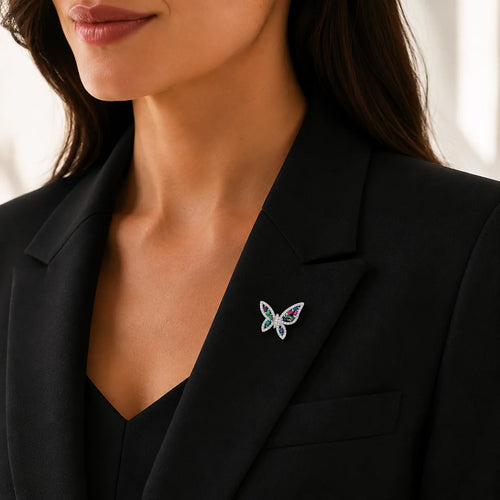 Sterling silver butterfly brooch with vibrant gemstones