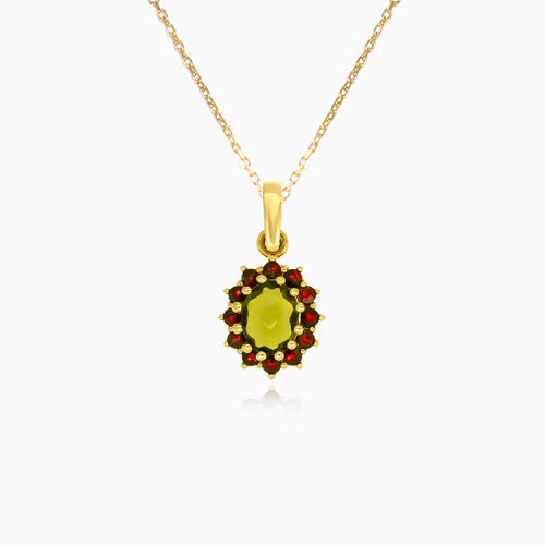 Royal Radiance in yellow gold with moldavite oval cut and garnet round stone