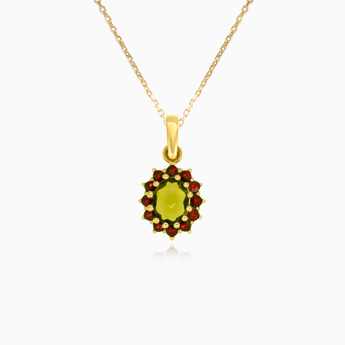 Royal Radiance in Gelbgold mit ovalem Moldavit und rundem Granatstein