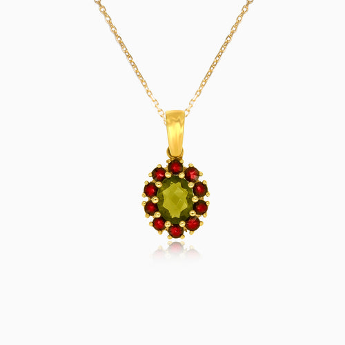 Elegant 14kt gold pendant with moldavite and garnet