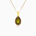 Golden Serenade Pendant In Yellow Gold With Pear Moldavite And Round Garnet