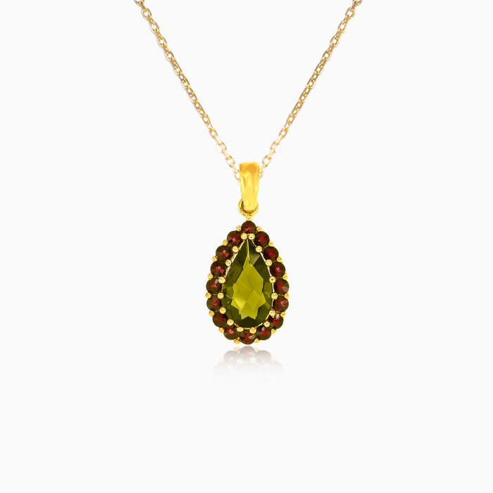 Golden Serenade-Anhänger aus Gelbgold mit Birnenförmigem Moldavit und Rundem Granat