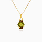 Yellow Gold Pendant with Oval Moldavite and Surrounding Garnet