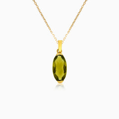Pendentif en or jaune avec pierre de moldavite longue taillée en ovale