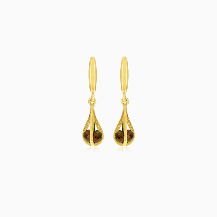 Trapped dangling garnet earrings