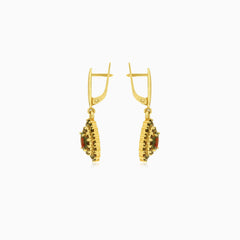 Regal 14kt gold garnet dangling earrings