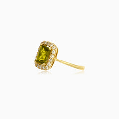 Radiant moldavite and cubic zirconia royal ring