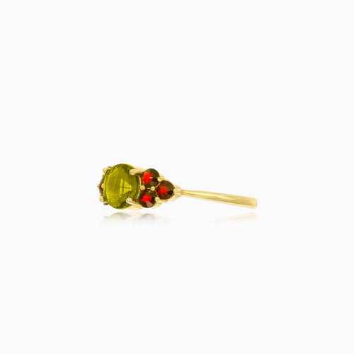 Elegant 14kt gold moldavite and garnet ring