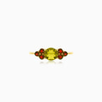 Elegantní prsten ze 14kt zlata s vltavínem a granátem