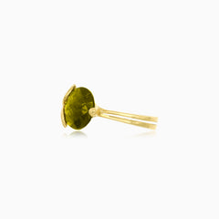 Moldavite elegance in yellow gold