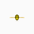 Elegant oval moldavite gold ring