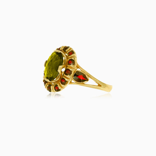 Ručně vyrobený zlatý prsten s vltavínem a granáty