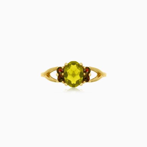 Zlatý prsten s vltavínem osazeným granáty