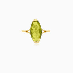 Oval cut modavite in gold ring