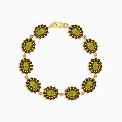 Pulsera de oro con moldavita y granate encantadora