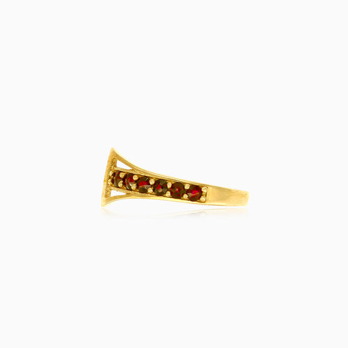 Nadčasový zlatý prsten s kulatými granáty