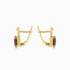 Oval garnet elegance earrings in 14kt gold