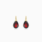 Graceful pear cut garnet earrings in 14kt gold