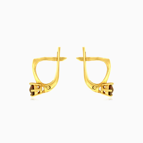 Round garnet gold prong earrings