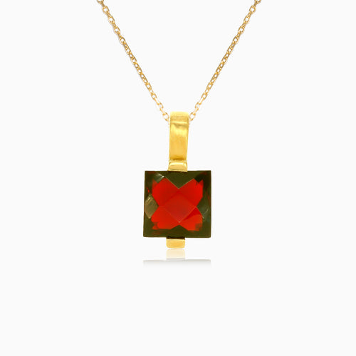 Princess cut garnet gold pendant