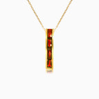 Long channel set garnet gold pendant