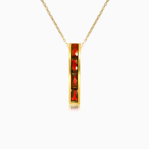 Long channel set garnet gold pendant