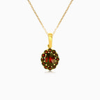 Graceful dance garnet 14kt gold pendant