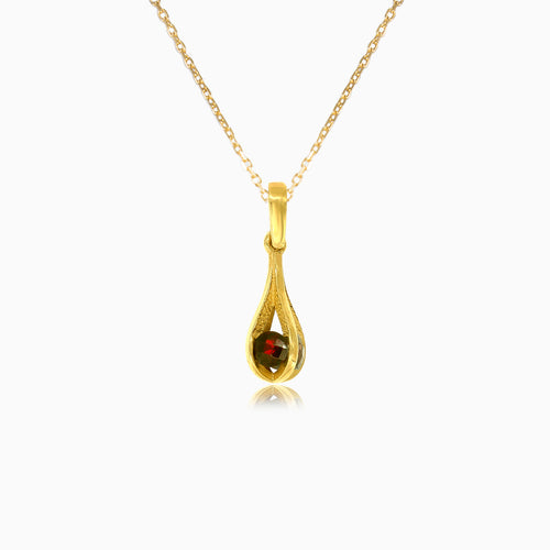 Trapped  garnet pendant