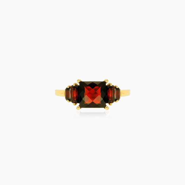 Bague élégante en or avec grenats taille princesse et radiant
