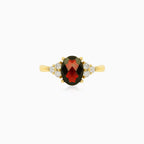 Elegant gold ring with garnet and cubic zirconia