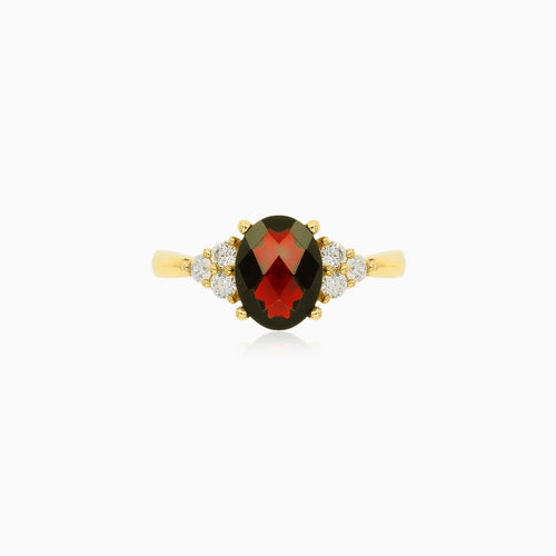 Elegant gold ring with garnet and cubic zirconia