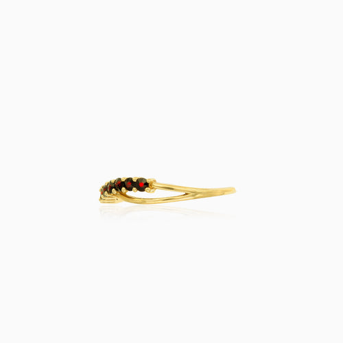Dámský elegantní zlatý prsten s granátem