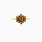 Delicate garnet flower ring in 14kt gold