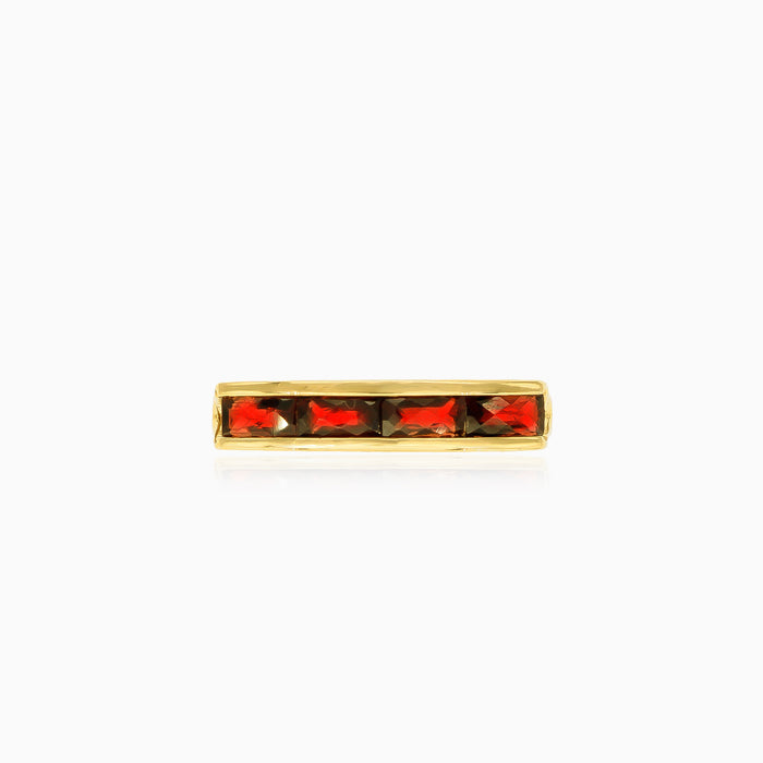 Langer Goldring mit Stabfassung und Granat