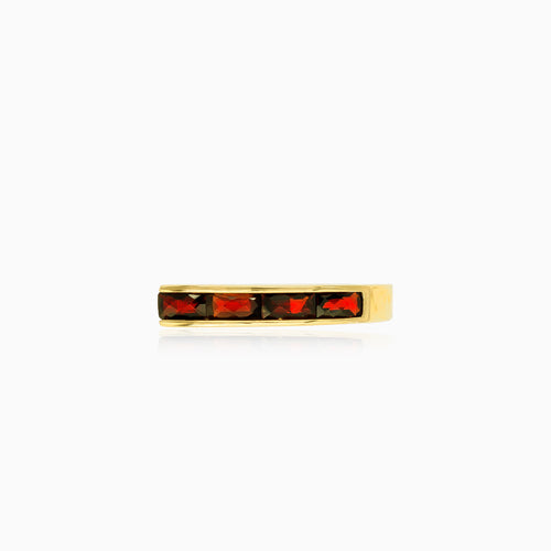 Long channel set garnet gold ring