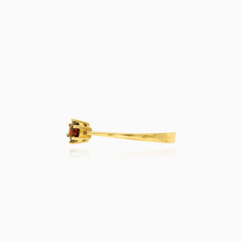 Round garnet gold prong ring