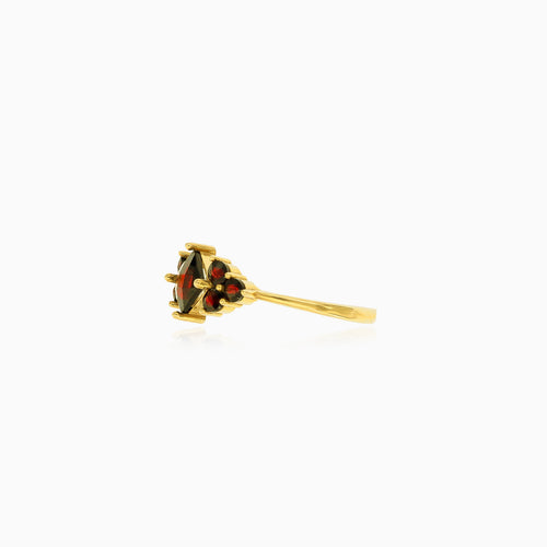 Square princess cut and round cut garnets ring in gold