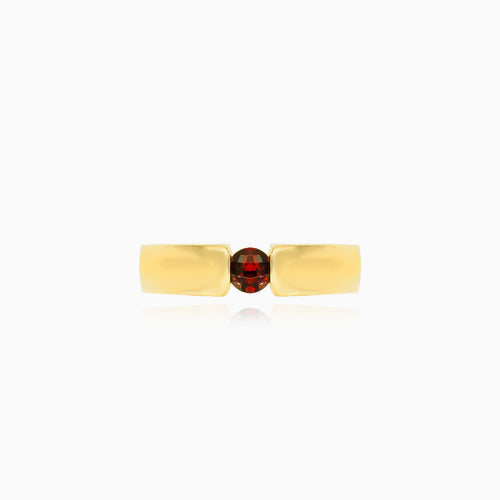 Zlatý prsten s napnutým kulatým granátem