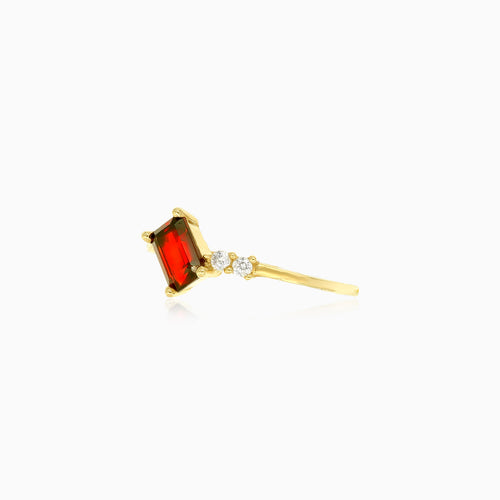 Emerald step cut garnet ring with cubic zirconia